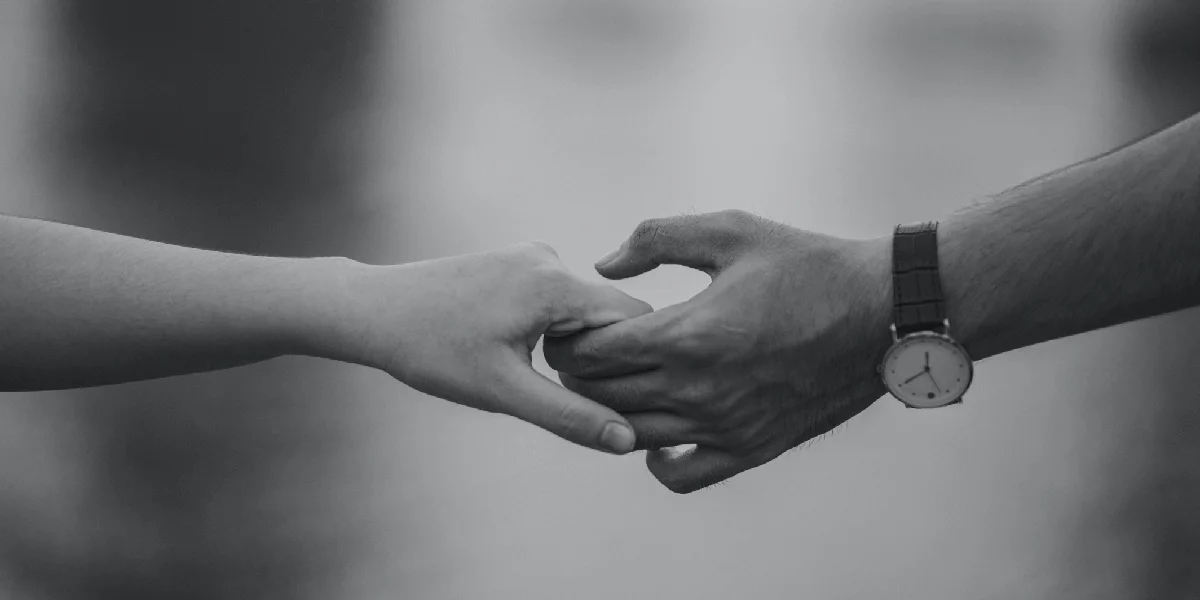 Loved ones holding hands
